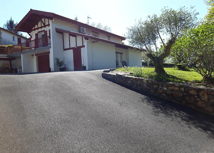 Appartement en rez de chaussee de maison