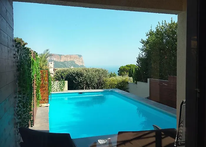Suite vue mer, grande piscine et spa extérieur privatifs,climatisation et parking